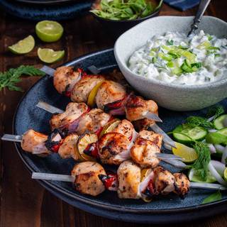 Cook in the grill at medium heat. Grill each side for 5 to 7 minutes. Take the chicken off the grill and drop some fresh lemon juice on it. Serve it with the tzatziki sauce.