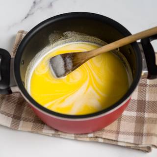 To make the dough, put the water, milk, sugar, butter, and salt on medium heat until the butter is melted and the water starts to boil.