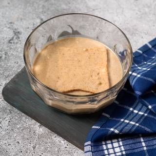 Dip the toasted bread in the batter and then grease each side of it in a frying pan.