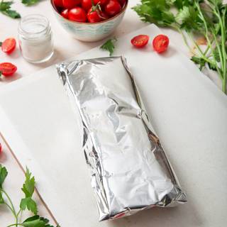 Wrap it with some foil, this way so you can put it in the oven or keep it in the freezer.