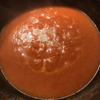 Simmer the sauce for 10 to 15 minutes until thickened as desired.
