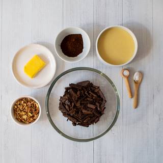 Dice the chocolate and melt over indirect heat (Bain Marie method).