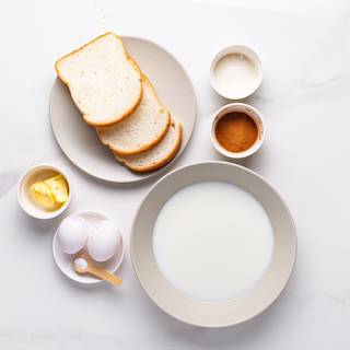 Pour the milk into a medium bowl.