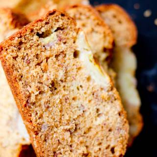 Wait for bread to cool completely and then slice it with a saw knife.