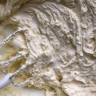 Add milk and any flavor or food color you like into the mixture. I choose vanilla extract for my buttercream. depending on what you are going to use the buttercream for, add milk to reach the consistency you want. you can add more or less than 2 tablespoons milk.