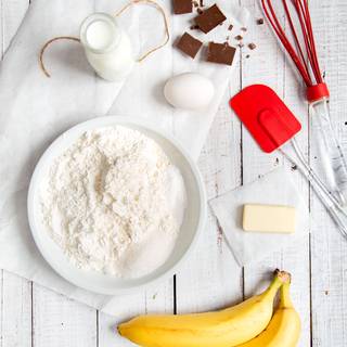 In the large bowl, mix flour, sugar, baking powder, and salt.