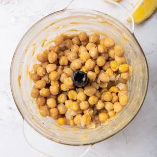 Add the chickpeas to the blender and mix until the mixture is well blended.