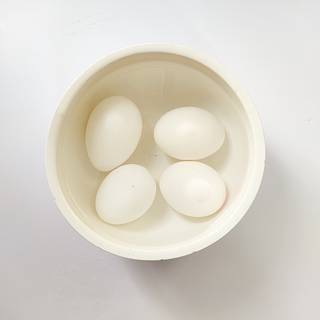 Remove eggs from hot water then put them in cold water. After one minute you can remove the eggshells easily.