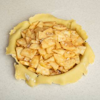 Pour the apple and cinnamon mixture inside your pie.