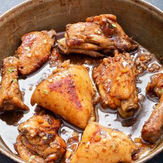 Heat the frying pan and put the chicken pieces in the frying pan until golden and completely cooked. If you are using chicken with bones, after frying both sides of the chicken, low the flame and put the frying pan lid, let the chicken cook more while flipping the chicken over every five minutes.