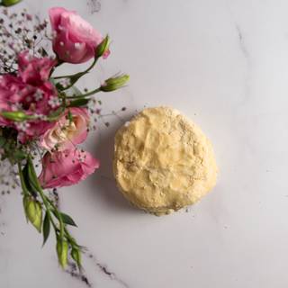 knead with your hands and put it in a plastic bag. With the help of a rolling pin smooth it and put it in the refrigerator. 