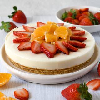 It's finally time to take your pan out of the fridge! This is the exciting part where you get to have fun decorating your cake using various fruits or colorful jello and take it to the next level. Hope you enjoy your no-bake cheesecake. Bon appetite!