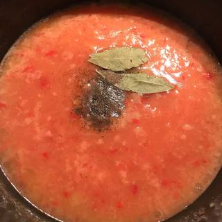 Stir to combine, add bay leafs and season with salt and pepper.