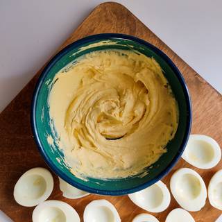 Stir the yolks with a fork or any tool, to make it creamy and smooth.