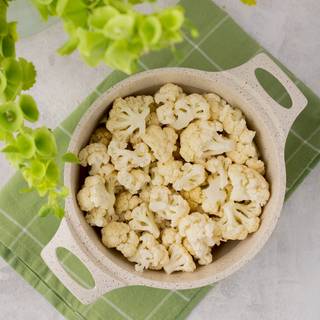 Fill half of a pot with water and cook the cauliflowers for 10 to 15 minutes on the heat until the water comes to boil and the cauliflowers become soft.