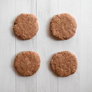 Divide the beef into 4 even parts, and shape it into patties with your hands. Heat the oil in a nonstick pan and fry the burgers. You can also grill them on a barbecue grill. 