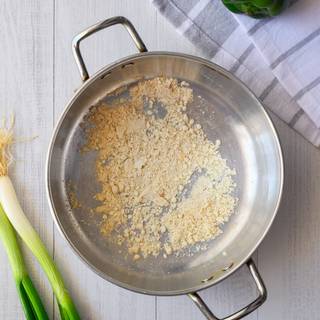 Melt two tablespoons of butter in a pan and add one tablespoon of flour to it and fry it a little, Then slowly add one cup of milk and stir until it becomes thick.