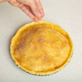 Mix some sugar and cinnamon and gently sprinkle them on your pie.