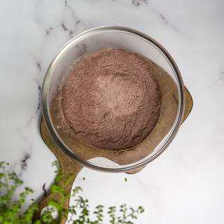 In a bowl, mix flour, cocoa powder baking powder, baking soda, and salt.