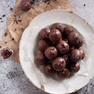 To decorate your truffles you can sprinkle chocolate chips or edible flowers or any other things you desire on the melted chocolate. 