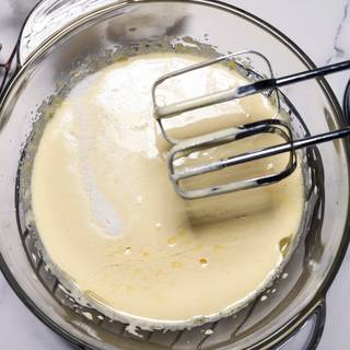Add the vegetable oil and vanilla to the batter and whisk until they are combined.