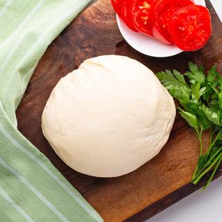 This dough is suitable for 2 pizzas with a diameter of approximately 20 cm. You can arrange the pizza ingredients and put them in the oven to cook.