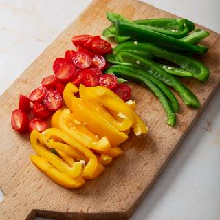 Chop your vegetables and fry them for 5 minutes to make them ready to use in your filling.