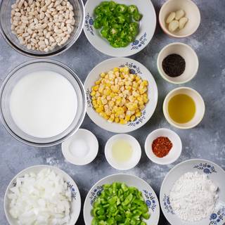 Mince the sweet pepper and chili. chop the onions. cook the corn and bean or use them caned.