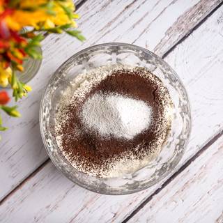Sift and whisk flour, baking powder, baking soda, salt, and cocoa powder in a deep bowl.
