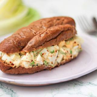 In the end, for serving it lettuce and every vegetable you like inside of the bread, make a great combination with salad. Finally, sprinkling some paprika makes it yummier.