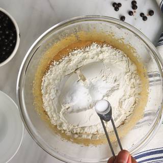 mix flour, baking powder, and salt together and add to the wet ingredients.