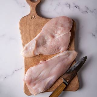 Cut the chicken breasts in half to make them thinner and have four chicken pieces.