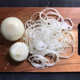 Cut the onions as thin as you can with a knife, separate the onion slices to have a crunchy french fried onions at the end.