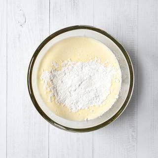 Sift flour and corn starch and add to the mixture until no flour streaks remain. Pour the egg mixture into the pan on medium heat and mixing it constantly. Stay still for a while to prevent the mixture from thickening too much!