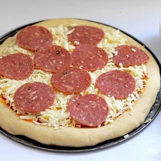 Pick the pepperonis on the cheese. The more pepperoni, the tastier your pizza is.