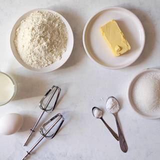 Prepare ingredients to cook pancakes.