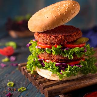 Fry the burgers in hot vegetable oil. Each side needs about 5 minutes to be cooked.