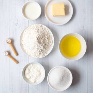 Prepare egg whites and yolks, then measure all the other ingredients.