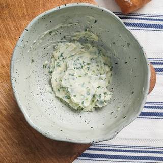 Mix butter, parsley, and garlic until they are combined.