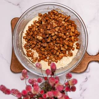 At last, add the apples and cinnamon mixture to the batter and mix them.