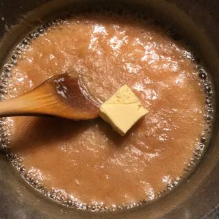 Add the butter, salt and vanilla powder and continue stirring.