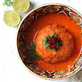 To serve, first put the Koofteh in the bowl and then pour the sauce. Some people serve it separately and pour bread into it. You can design it with barberry and plum. You can also use orange juice and lemon if you want to make it sour.