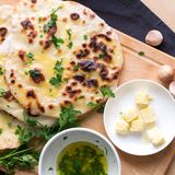 Warm Indian Garlic Naan With Pan