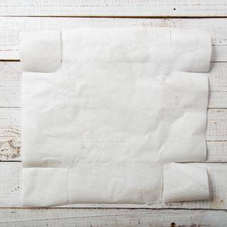 Cut the parchment paper to the size of your baking dish. cut four sides of it so you can cover all of your dishes.