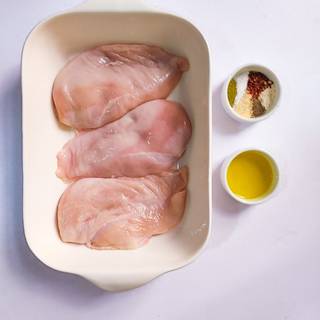 If the chicken breasts have bones, separate them from the bones. Place in a suitable oven.