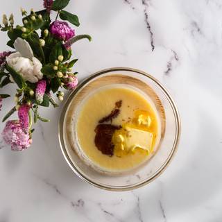 Now pour your filling into a big bowl and add butter and vanilla to it. Cover with plastic and put it inside the fridge to rest and become cool.