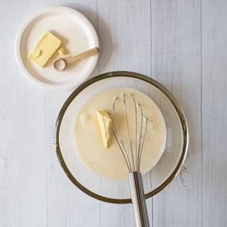 Add room temperature butter first, and whisk well.