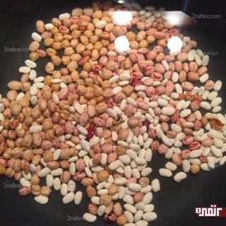 put frijoles that we already soaked in the pot( except lentils) with water and a little part of fried onion and hot garlic on the heat.