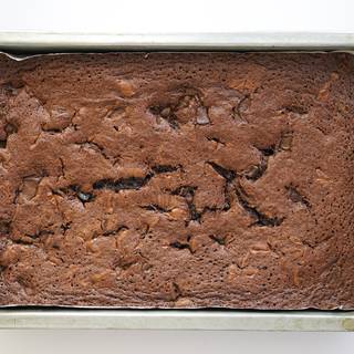 It's up to you how much you want to bake your brownie. If you enjoy its soft texture you can take your brownie out of the oven sooner but if you like it more crispy then you have to wait a little longer about 30 to 35 minutes.