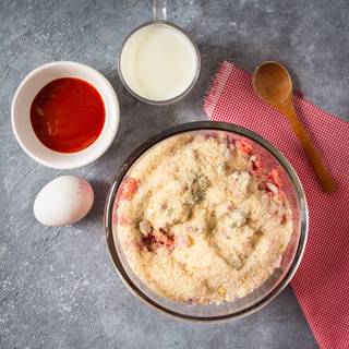 Add bread crumbs and knead well until smooth.